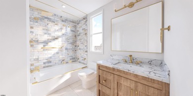 Welcome to 9612 Monmouth Avenue, a stunning brand-new coastal - photo 15