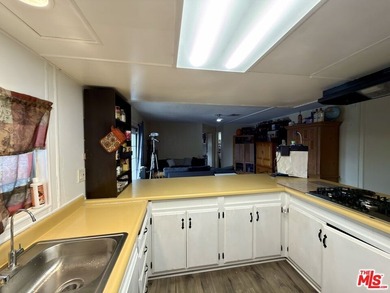 Spacious and rare 4-bedroom, 2-bath double-wide located in the - photo 19
