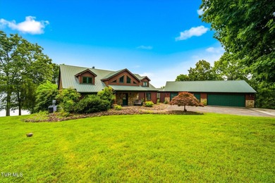 Stunning log home on the main channel of Douglas Lake! This - photo 3