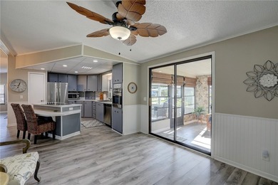 Situated on a sought-after 75' x 100' Haven Green lot, this - photo 9