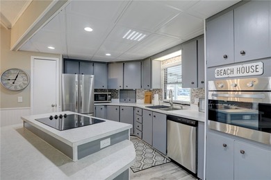 Situated on a sought-after 75' x 100' Haven Green lot, this - photo 10