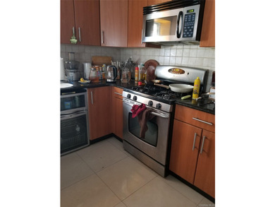 Discover this spacious 3-bedroom, 2-bath condominium residence - photo 2
