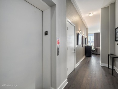 A private elevator entry opens directly into a beautifully