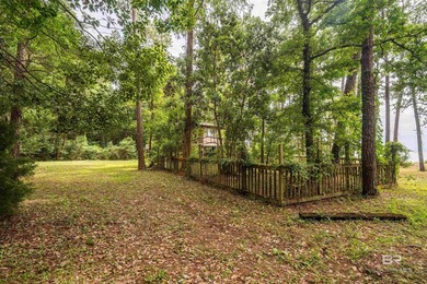 There's a stretch of shoreline in Fairhope where the land opens - photo 9