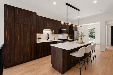 Move-in ready new construction at The Kenwood Reserve, an - photo 4