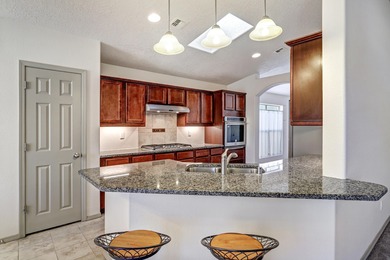 Welcome to this beautiful single-story home offering comfort