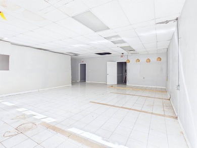 This commercial property offers a prime opportunity with high - photo 5