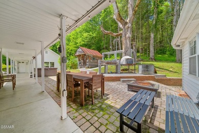 This well-known iconic white farmhouse sits proudly in the heart - photo 13