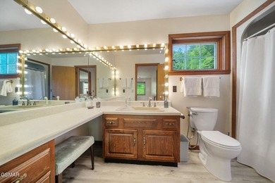 This well-known iconic white farmhouse sits proudly in the heart - photo 17