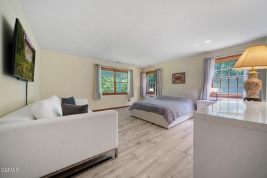 This well-known iconic white farmhouse sits proudly in the heart - photo 20