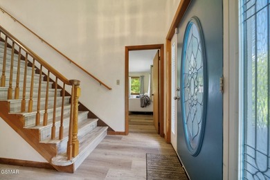 This well-known iconic white farmhouse sits proudly in the heart - photo 27