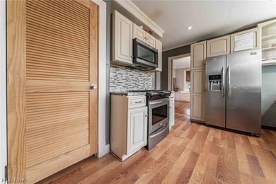 Welcome to 20303 Lake Shore Blvd, a spacious 5-bedroom Colonial - photo 9