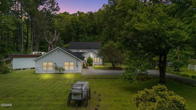This well-known iconic white farmhouse sits proudly in the heart - photo 50