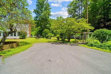 This well-known iconic white farmhouse sits proudly in the heart - photo 59