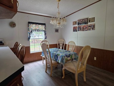 Welcome home to this inviting Fruitland/Crescent City home - photo 4