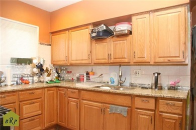 Welcome to this beautifully maintained Colonial one-family home - photo 8
