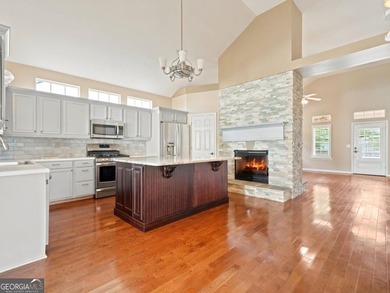 You will LOVE this updated cottage-style home in the highly - photo 8