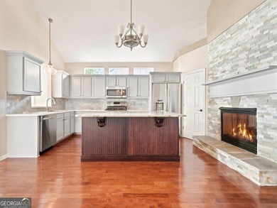 You will LOVE this updated cottage-style home in the highly - photo 9