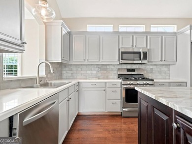 You will LOVE this updated cottage-style home in the highly - photo 10