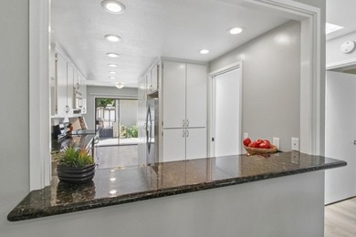 Rare single-level townhouse with no residence above or below in - photo 12