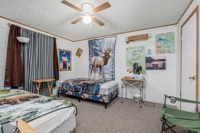 Fishing & Hunting Camp with Mountain Views and River Frontage - photo 25