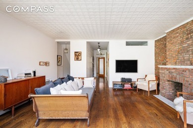 192 Nelson Street is a warm and welcoming three-family townhouse - photo 4