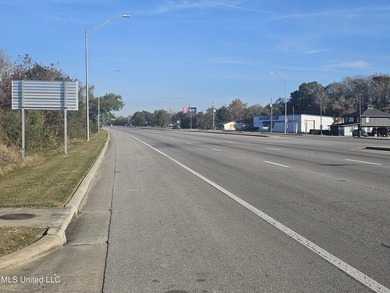 Highway 49 lots just north of Lowes, 84 Lumber and Hoods. Across - photo 2
