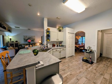 This freshly painted spacious pool home sits on a corner lot - photo 14