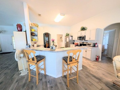 This freshly painted spacious pool home sits on a corner lot - photo 17