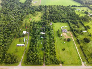 Enjoy the best of both worlds with this 5.365 acre property in - photo 4