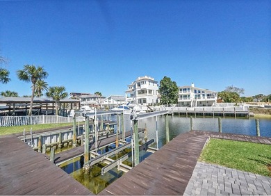 Waterfront luxury meets effortless coastal living--this is the - photo 4