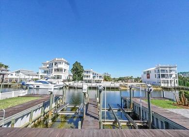 Waterfront luxury meets effortless coastal living--this is the - photo 5