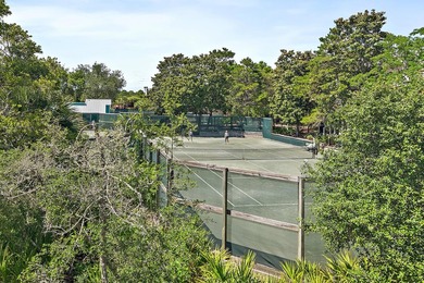 Located in a gated community with private deeded beach access - photo 11