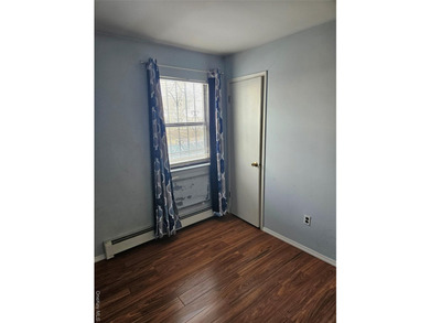 Nicely maintained 2 family home with wood floors. 1st floor has - photo 24