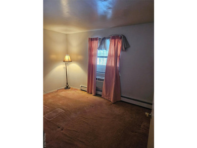 Nicely maintained 2 family home with wood floors. 1st floor has - photo 25