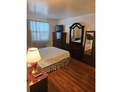 Nicely maintained 2 family home with wood floors. 1st floor has - photo 27