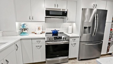 Experience coastal living at Aquanique Ocean Club on North - photo 9
