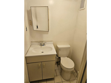 Nicely maintained 2 family home with wood floors. 1st floor has - photo 29