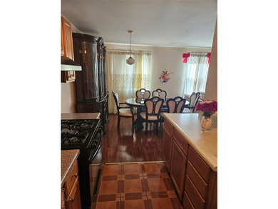 Nicely maintained 2 family home with wood floors. 1st floor has - photo 30