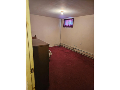 Nicely maintained 2 family home with wood floors. 1st floor has - photo 37