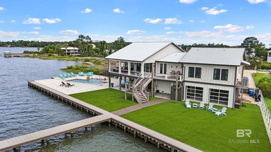 Experience waterfront living at 27701 E Beach Blvd, a Gold - photo 1
