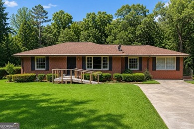 If you're looking for a solid, well maintained brick ranch with - photo 1