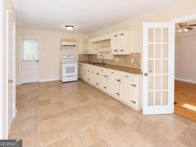 If you're looking for a solid, well maintained brick ranch with - photo 2