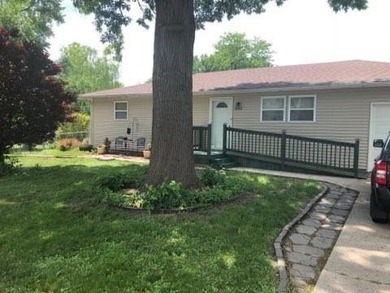 Well-maintained ranch home situated on a desirable corner lot
