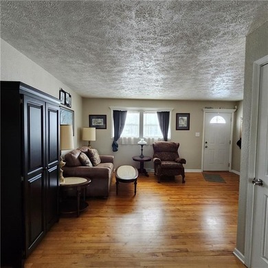 Well-maintained ranch home situated on a desirable corner lot