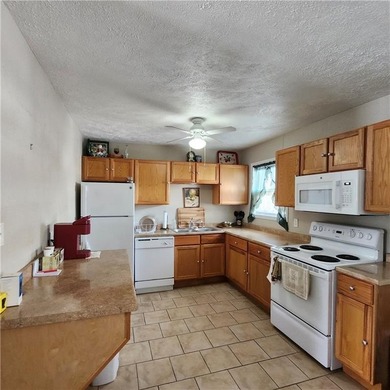 Well-maintained ranch home situated on a desirable corner lot