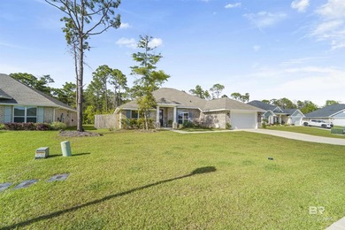 Welcome to this beautifully designed 4-bedroom, 3-bath brick - photo 2