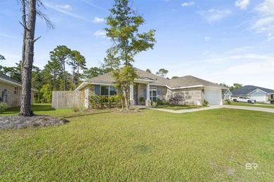 Welcome to this beautifully designed 4-bedroom, 3-bath brick - photo 3