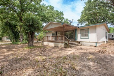 This home sits on three corner lots totaling almost half an acre - Lake Home For Sale in Gun Barrel City, Texas