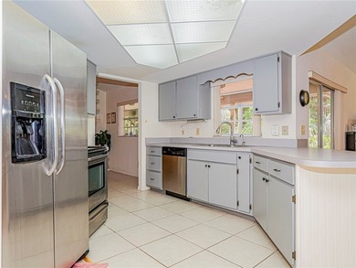 Sebastian, FL! This home features a metal roof, tile thru out, 3 - photo 8